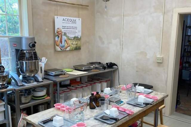 table with candle making equipment