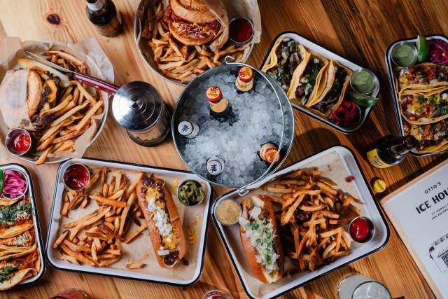 food and beer spread on a table