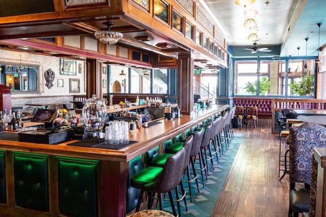Bartop with seating and wooden floors