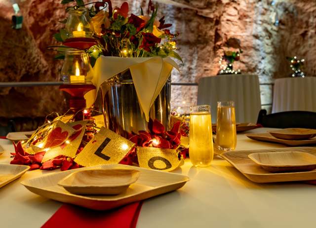 Romantic dinner setup inside cavern