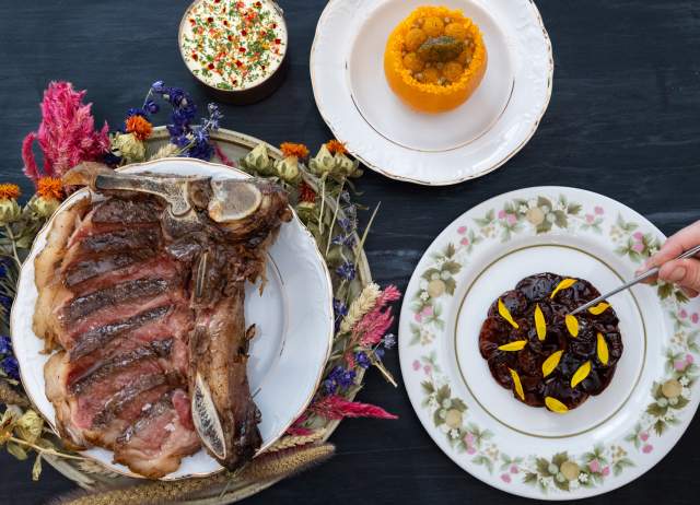 Overhead view of meats and dishes