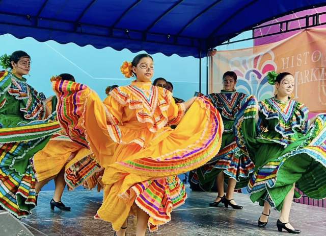 Folklorico dancers in Day of the Dead makeup
