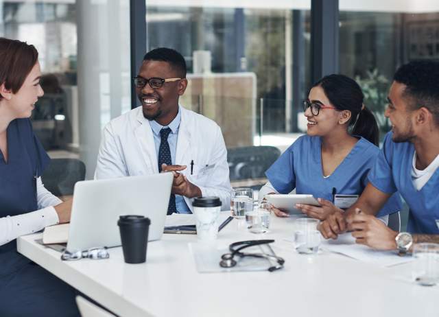 Group of medial professionals talking to each other