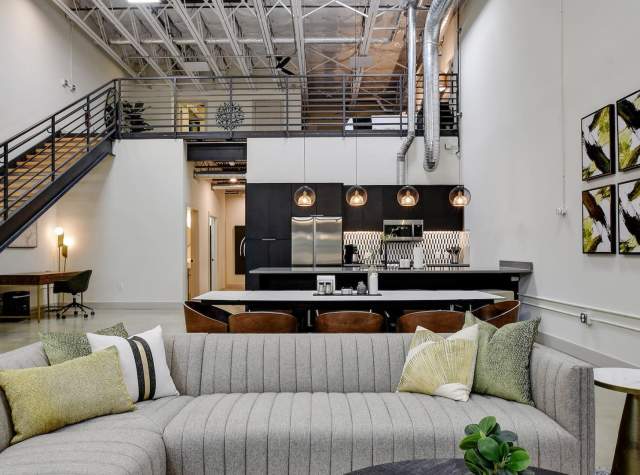 Living room view of rental with staircase