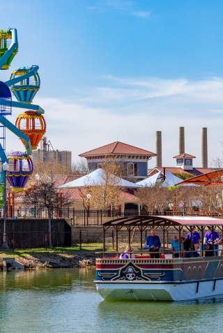 Overview of Morgan's Wonderland with ferris wheel and passenger boat
