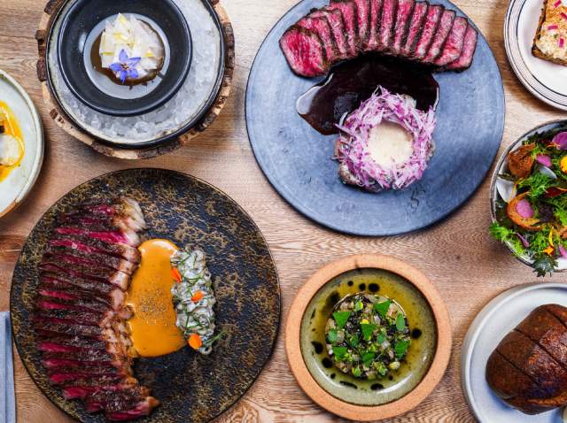 Overhead view of food spread at Isidore at Pullman Market in San Antonio.