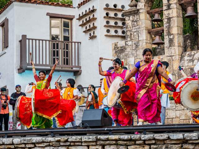 Performers in traditional Indian attire at DiwaliSA in San Antonio.