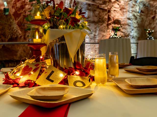 Romantic dinner setup inside cavern