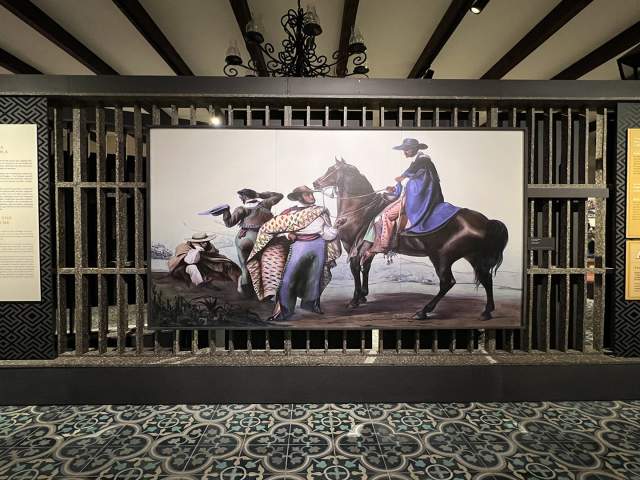 cowboy art piece inside of museum