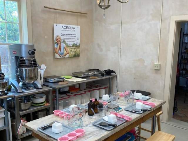 table with candle making equipment