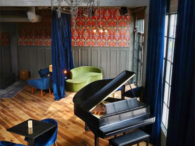 Piano with blue chair