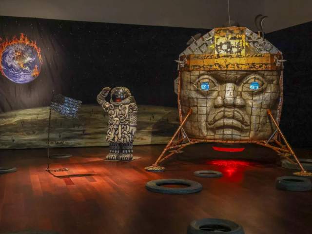Artwork of Astronaut by Large Sculpture of head