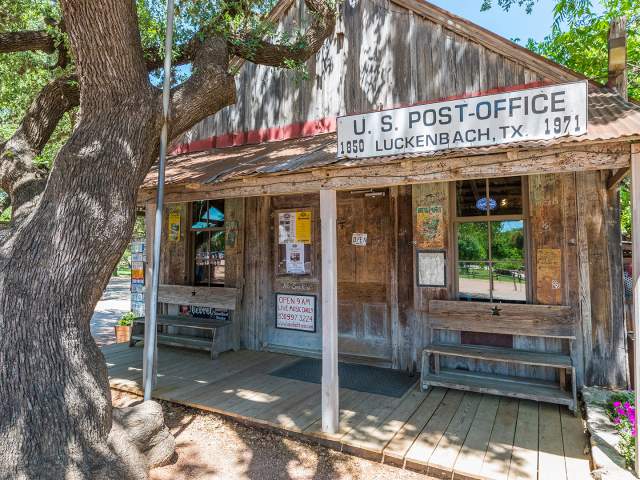 Exterior view of wooden post office building.