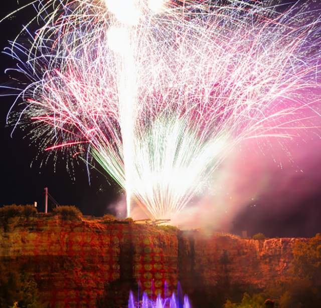 Fireworks at the top of a quarry
