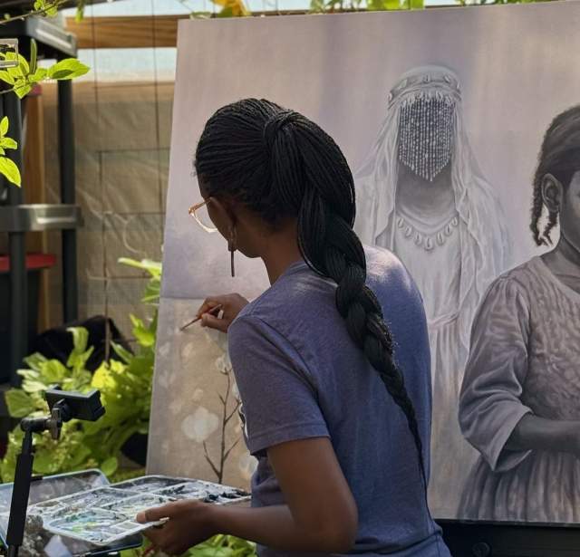 Ismani Sun painting on a canvas