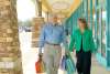 man and woman walking