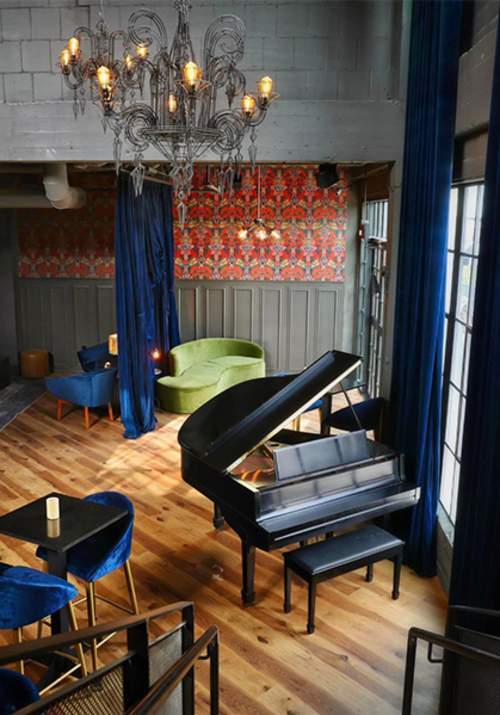 Piano with blue chair