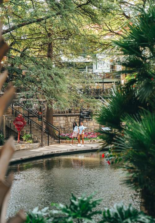 Couple strolling along River Walk