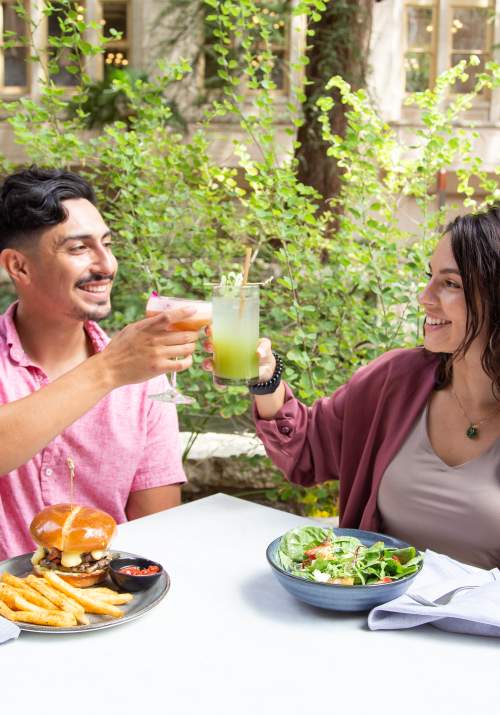 Couple cheers and dines on the San Antonio River Walk