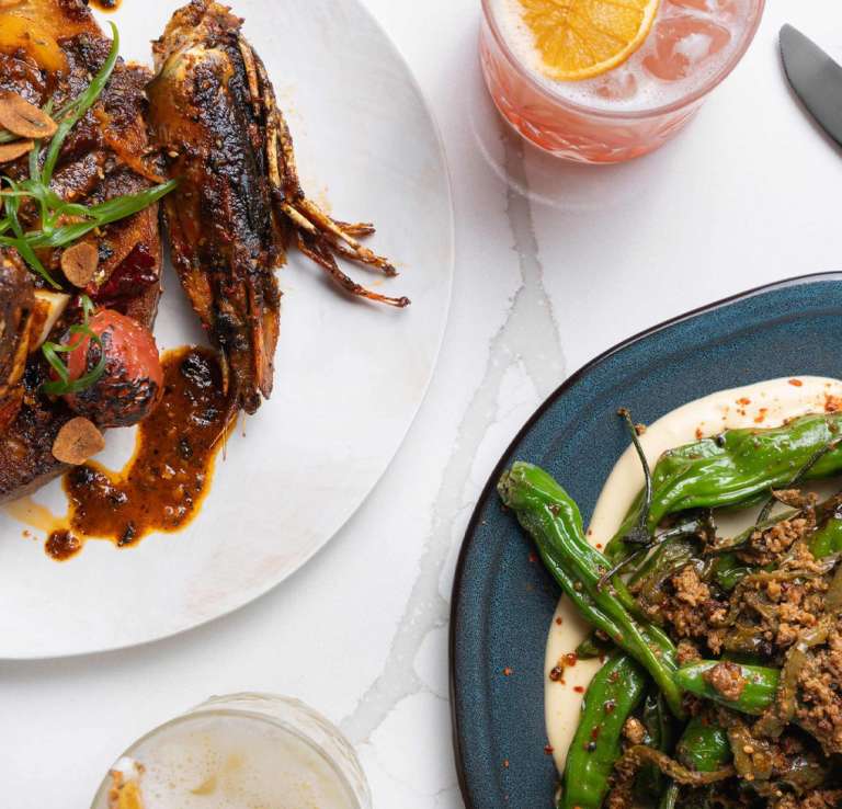 Overhead view of dining spread at Esencia at the St. Anthony Hotel in San Antonio.