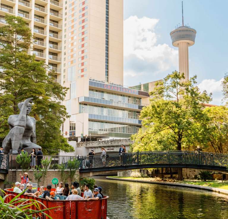 Go Rio river barge in front of Citlali / Stargazer sculpture.