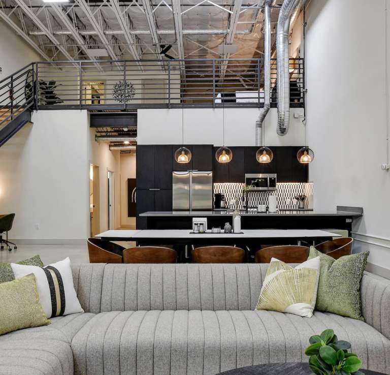 Living room view of rental with staircase