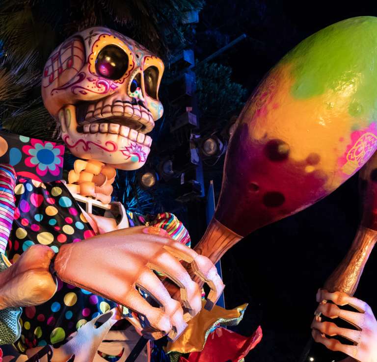 Statue of skeleton holding maracas