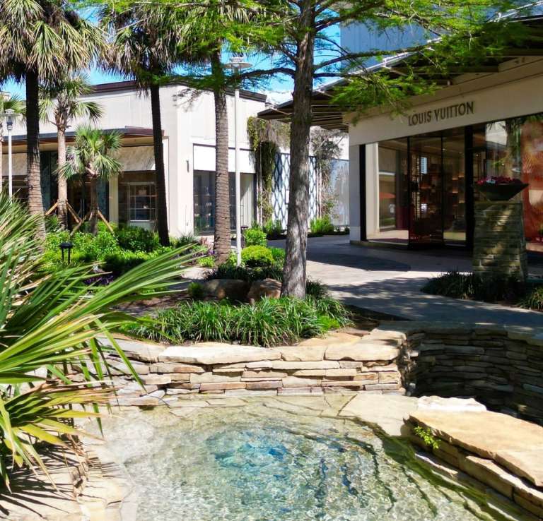 Outdoor shopping mall with water fountain