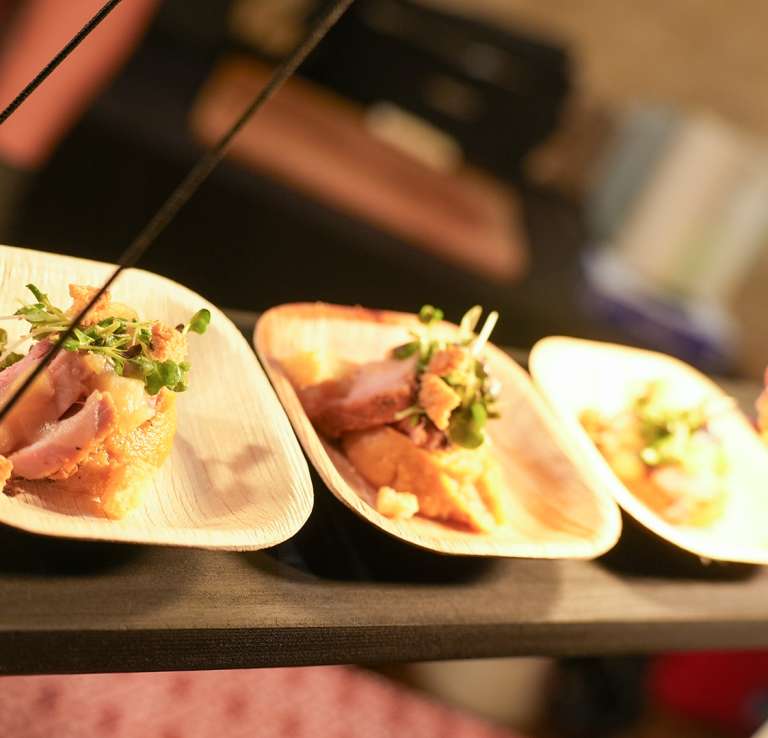 Delicacy food spread with lightbulb in distance