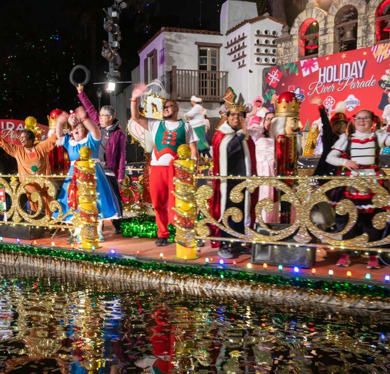 Holiday themed river barge on River Walk