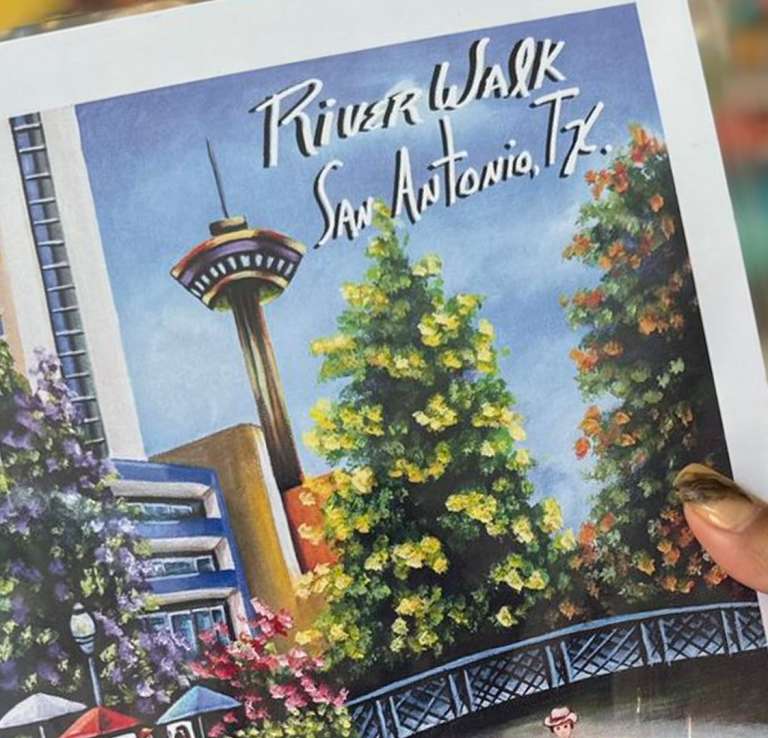 hand holding postcard painting of Tower of the Americas