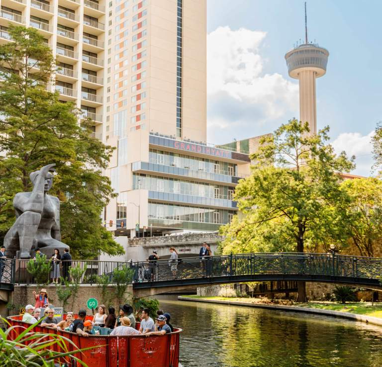 Go Rio river barge in front of Citlali / Stargazer sculpture.