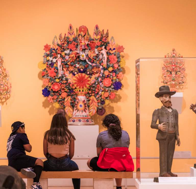 family at latino american art exhibit at San Antonio Museum of Art
