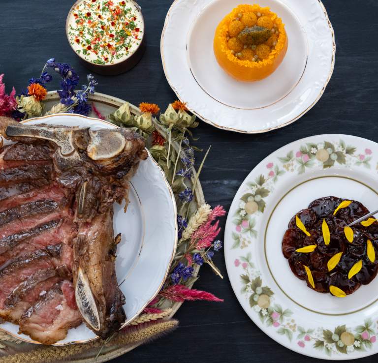 Overhead view of meats and dishes