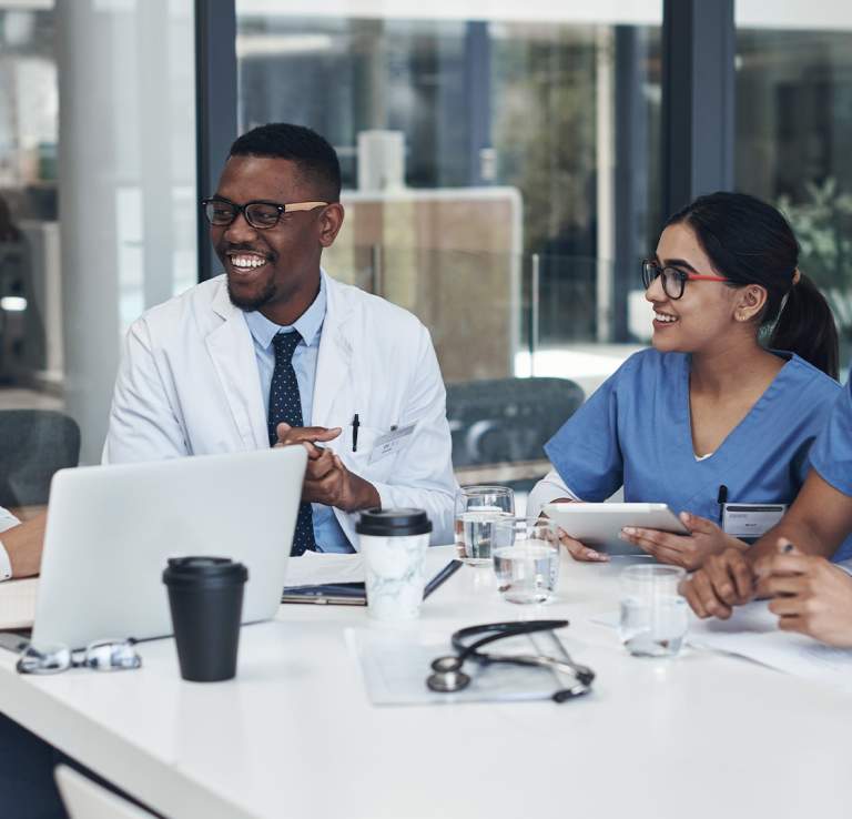 Group of medial professionals talking to each other