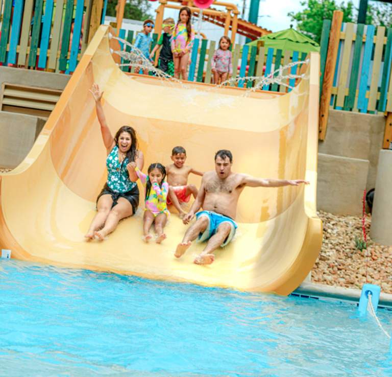 Family on waterslide at Schlitterbahn.
