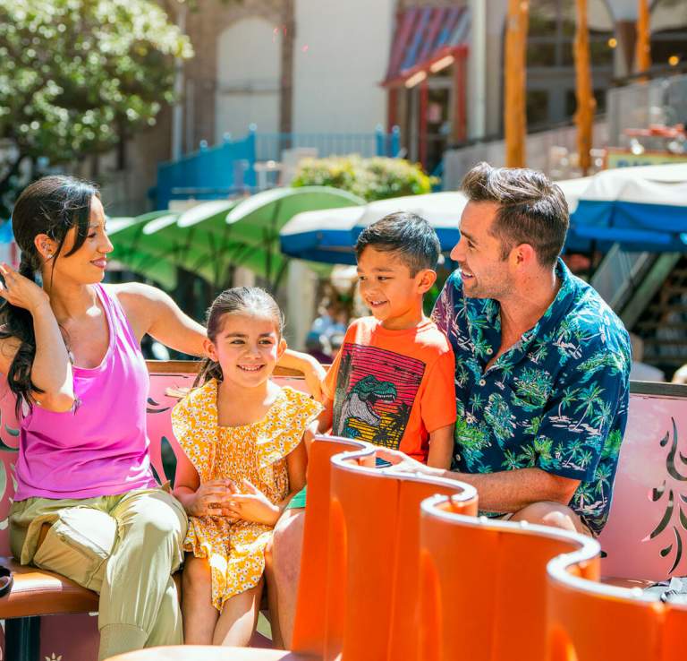 Smiling family on a Go Rio River Cruise on the River Walk