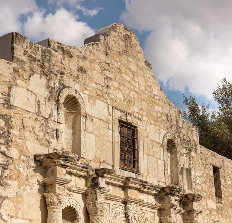 Upper portion of Alamo's facade.