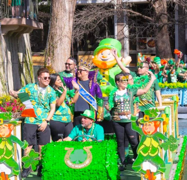 Parade float decorated in green decor for St. Patrick's Day