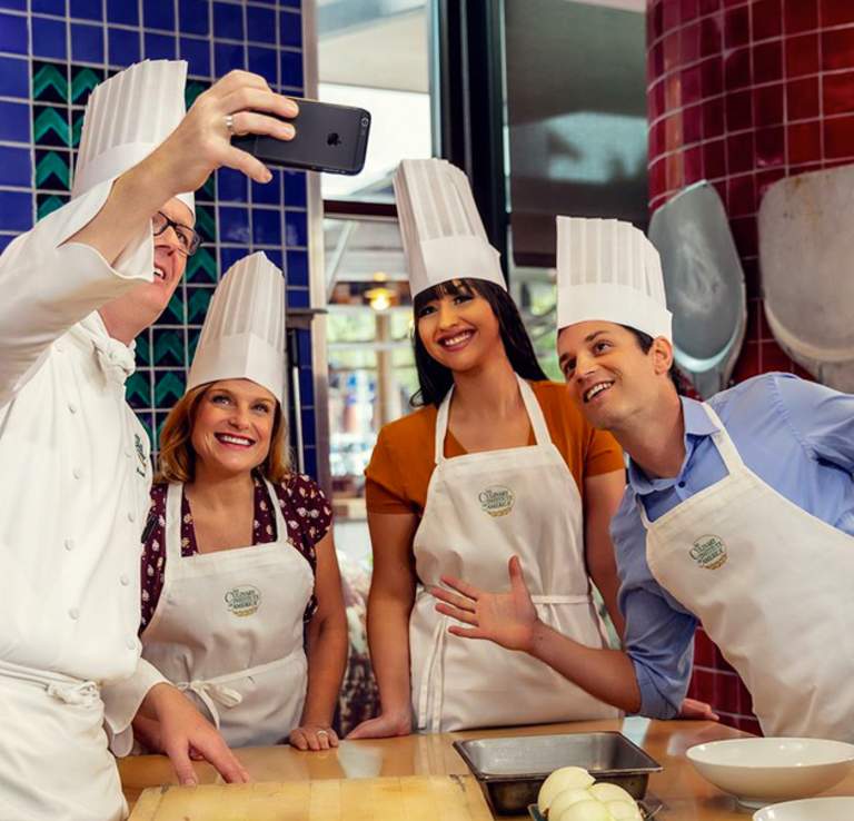 Professional group dressed as chefs in kitchen