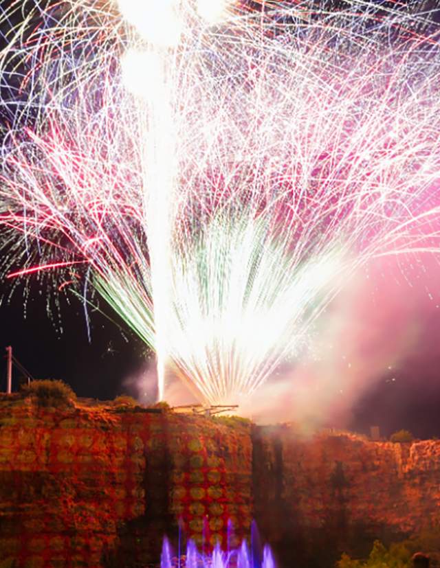 Fireworks at the top of a quarry
