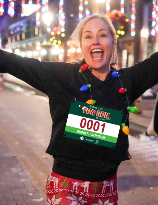 Woman running in Holiday Fun Run