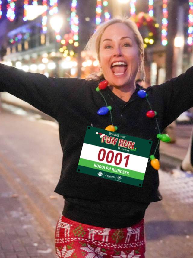 Woman running in Holiday Fun Run