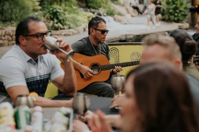 people dining on a river walk barge