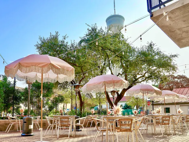 Tower of the Americas in the background of restaurant patio