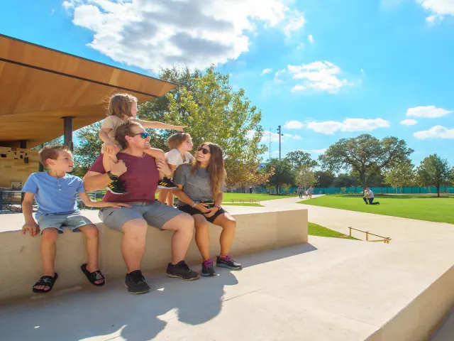 family at park sunny day