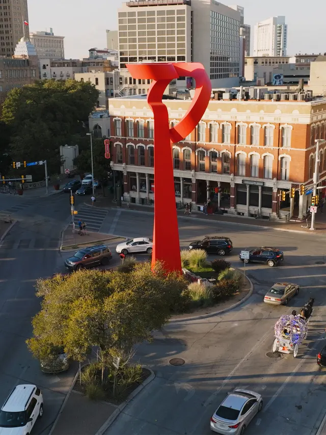 Overhead view of downtown San Antonio with Torch of Friendship sculpture.