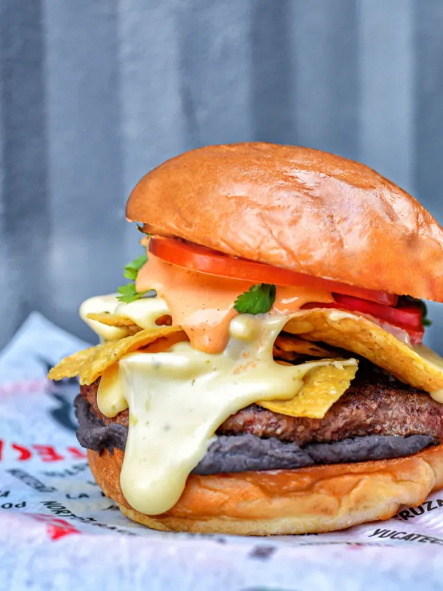 Loaded hamburger with melted cheese