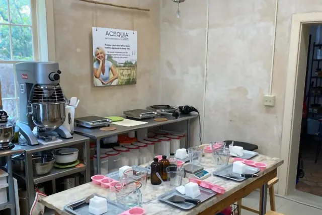 table with candle making equipment