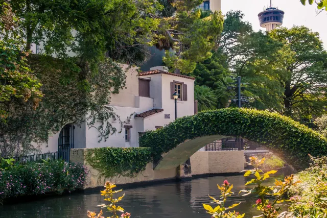 The River Walk bridge with Tower of the Americas in background